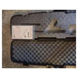 Thompson hard case gun case, Plano hard case gun case, and Thompson Chicago typewriter hard case gun case