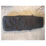 Cabelas camo gun case and black 5.11 VTAC gun case