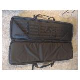 Cabelas camo gun case and black 5.11 VTAC gun case