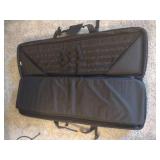 Cabelas camo gun case and black 5.11 VTAC gun case