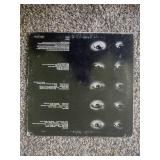 12 records: Simon & Garfunkel Bridge over Troubled Water, Jefferson Starship, Rainbow Rising, Tommy Bolin Private Eye,  Chaka Khan, Steve Wonder, Rainbow, Tommy Bolin