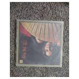 12 records: Simon & Garfunkel Bridge over Troubled Water, Jefferson Starship, Rainbow Rising, Tommy Bolin Private Eye,  Chaka Khan, Steve Wonder, Rainbow, Tommy Bolin