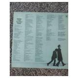 12 records: Simon & Garfunkel Bridge over Troubled Water, Jefferson Starship, Rainbow Rising, Tommy Bolin Private Eye,  Chaka Khan, Steve Wonder, Rainbow, Tommy Bolin