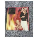 12 records: Simon & Garfunkel Bridge over Troubled Water, Jefferson Starship, Rainbow Rising, Tommy Bolin Private Eye,  Chaka Khan, Steve Wonder, Rainbow, Tommy Bolin