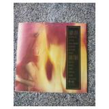 12 records: Simon & Garfunkel Bridge over Troubled Water, Jefferson Starship, Rainbow Rising, Tommy Bolin Private Eye,  Chaka Khan, Steve Wonder, Rainbow, Tommy Bolin