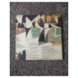 12 records: Simon & Garfunkel Bridge over Troubled Water, Jefferson Starship, Rainbow Rising, Tommy Bolin Private Eye,  Chaka Khan, Steve Wonder, Rainbow, Tommy Bolin