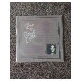 12 records: Simon & Garfunkel Bridge over Troubled Water, Jefferson Starship, Rainbow Rising, Tommy Bolin Private Eye,  Chaka Khan, Steve Wonder, Rainbow, Tommy Bolin