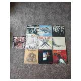 10 records: UFO, Angel City, Meatloaf, Eric Clapton, Cheap Trick, Commodore etc