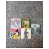 5 records, Rex where do we go from here, mountain twin peaks, Styx the grand illusion, wild-eyed southern boys, 38 special, and who’s next