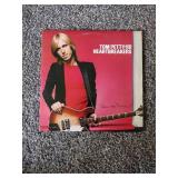 5 records Ted Nugent epic record, wet Willie II capricorn records, tom petty and the heart breakers, corner stone Styx, and edger winters white trash.