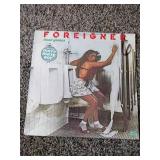 3 records: Neil Young, The Cars Panorama, Foreigner head games