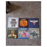 4 Records & 2 album covers: Three Dog Night, Reo Speedwagon & Molly Hatchet, & Van Halen