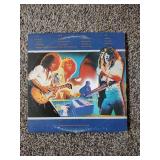 4 Records & 2 album covers: Three Dog Night, Reo Speedwagon & Molly Hatchet, & Van Halen