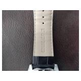 Invicta watch New in box and watch case for displaying watches.