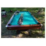 Regulation Pool Table With Set of Balls and Assorted Cue Sticks
