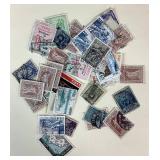 Collection of stamps from Pakistan, Paraguay and Peru dating back to 1860