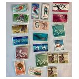 Collection of Themed International Stamps of Space, Airplanes, Flowers, Auto, Ships, Trains, Sports, Art and Costumes