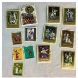 Collection of Themed International Stamps of Space, Airplanes, Flowers, Auto, Ships, Trains, Sports, Art and Costumes