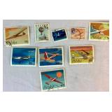Collection of Themed International Stamps of Space, Airplanes, Flowers, Auto, Ships, Trains, Sports, Art and Costumes