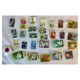 Collection of Themed International Stamps of Space, Airplanes, Flowers, Auto, Ships, Trains, Sports, Art and Costumes
