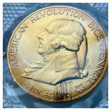 American Coin Sets with 1974 US Proof Sets, 1975 Bicentennial Commemorative Medal & Stamps Set, 1974 Bicentennial first Day Cover Sets, and American Revolution Bicentennial Commeroratvie Meadl and Fir