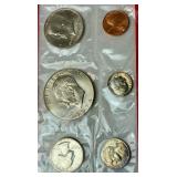 American Coin Sets with 1974 US Proof Sets, 1975 Bicentennial Commemorative Medal & Stamps Set, 1974 Bicentennial first Day Cover Sets, and American Revolution Bicentennial Commeroratvie Meadl and Fir