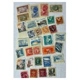 Small Box Full of a Multitude of International Stamps
