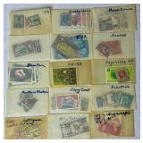 Small Box Full of a Multitude of International Stamps