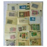 Small Box Full of a Multitude of International Stamps