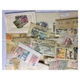 Small Bin of Sleeved International Stamps