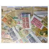 Small Bin of Sleeved International Stamps