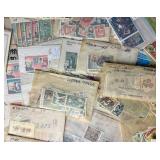 Small Bin of Sleeved International Stamps