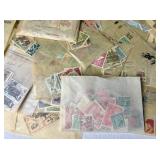 Small Bin of Sleeved International Stamps