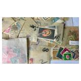 Small Bin of Sleeved International Stamps
