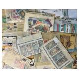 Small Bin of Sleeved International Stamps