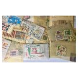 Small Bin of Sleeved International Stamps