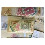 Small Bin of Sleeved International Stamps