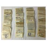 Box Full of an Assortment of International Stamps