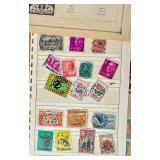 Bundle of Global Postage Stamps and 1982 USPS Stamp Album