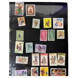 Bundle of Global Postage Stamps and 1982 USPS Stamp Album