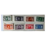 Bundle of Global Postage Stamps and 1982 USPS Stamp Album