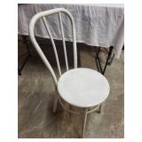 Used White Metal Chair with Minor Wear