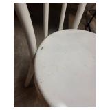 Used White Metal Chair with Minor Wear