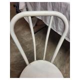Used White Metal Chair with Minor Wear