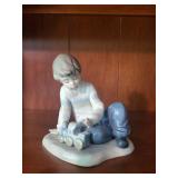 Nao by Lladro Porcelain Figurine - Boy with Toy Train