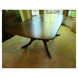 Antique Duncan Phyfe Style Mahogany Dining Table with One Leaf in the table and Two Self-Storing Extension Leaves