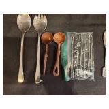 Assorted Vintage Kitchen Utensils Including Salad Servers, Wooden Spoons, and Fondue Forks