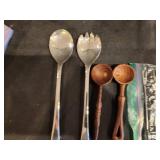 Assorted Vintage Kitchen Utensils Including Salad Servers, Wooden Spoons, and Fondue Forks
