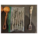 Assorted Vintage Kitchen Utensils Including Salad Servers, Wooden Spoons, and Fondue Forks