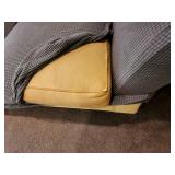 Used Sofa with Striped Throw Pillows